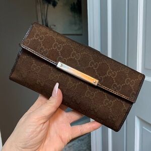 Authentic and vintage Gucci brown cloth and leather long continental wallet